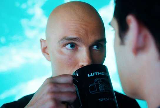 Actor Nicholas Hoult as Lex Luthor, sipping coffee in 'Superman'.